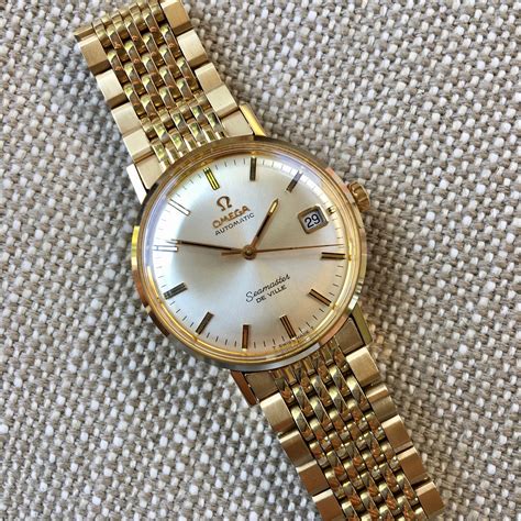 omega seamaster gold vintage price